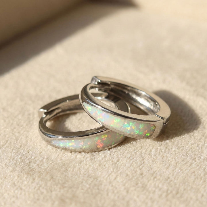 White Opal Tapered Sterling Silver Huggie Hoop Earrings