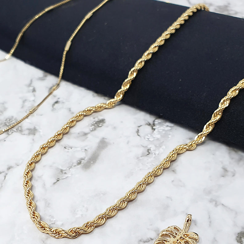 18k gold filled, 3 mm wide rope chain adjustable from 16" to 18"