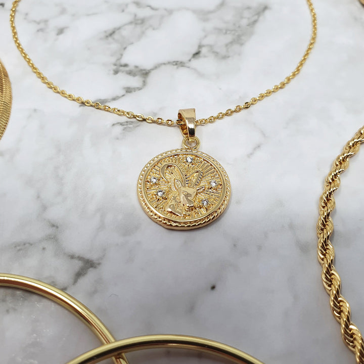 18k gold Capricorn  zodiac pendant charms.